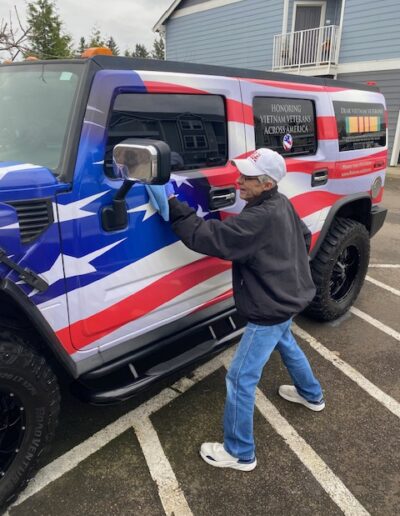 Friend Tim McHale detailing Hummer for when we drive in the National Memorial Day Parade.